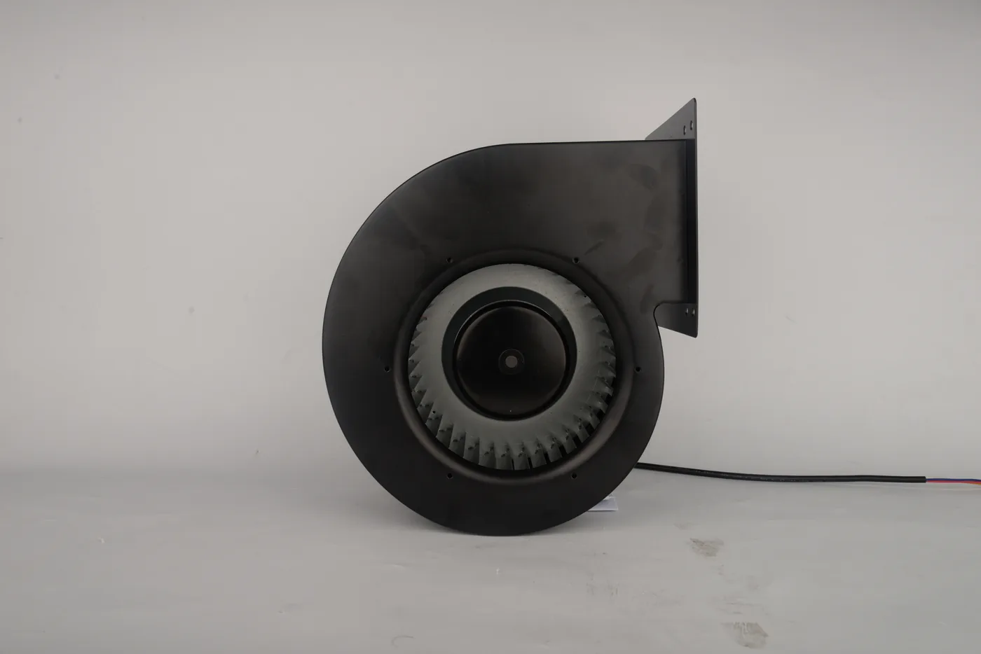 DC blower with single inlet scroll housing
